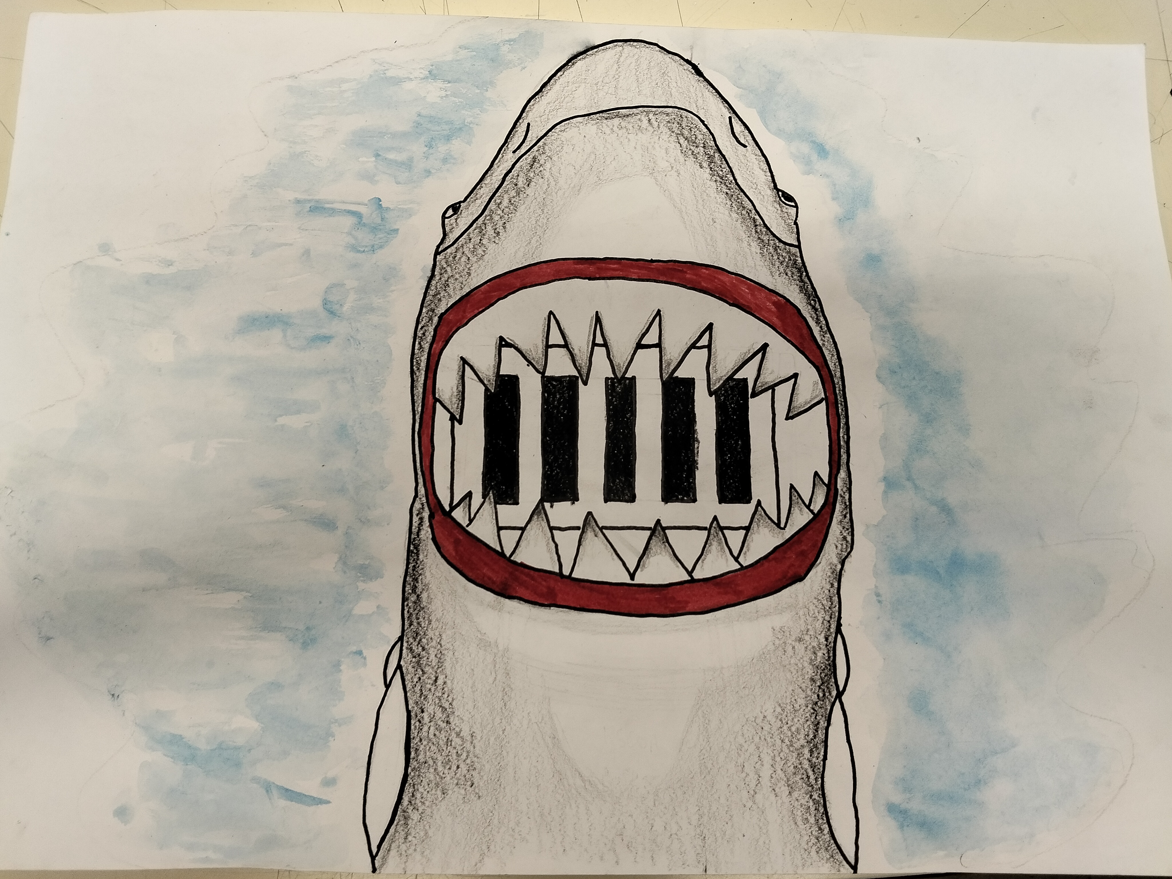 O mar começa aqui- desenho do tubarão