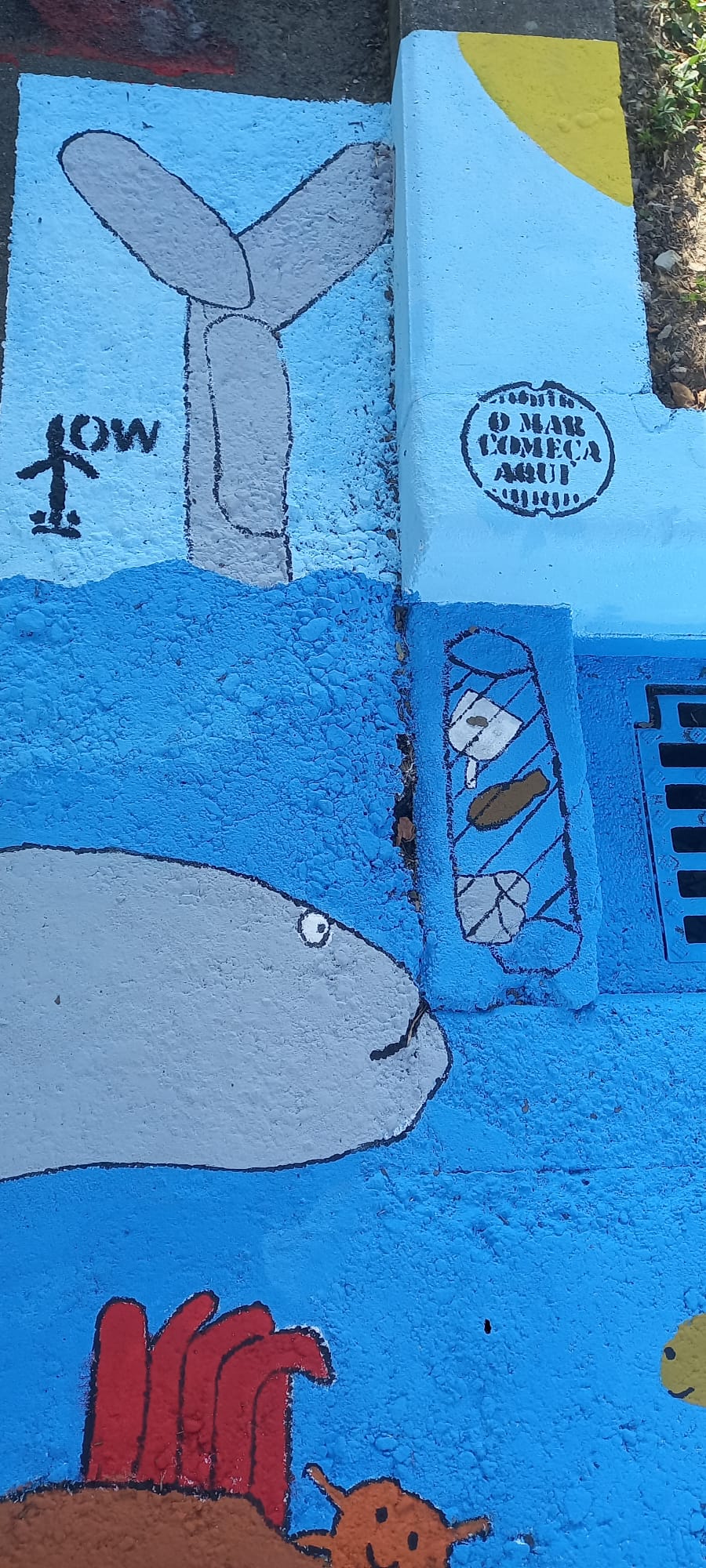 Pintura da torre eólica e o logotipo OW.